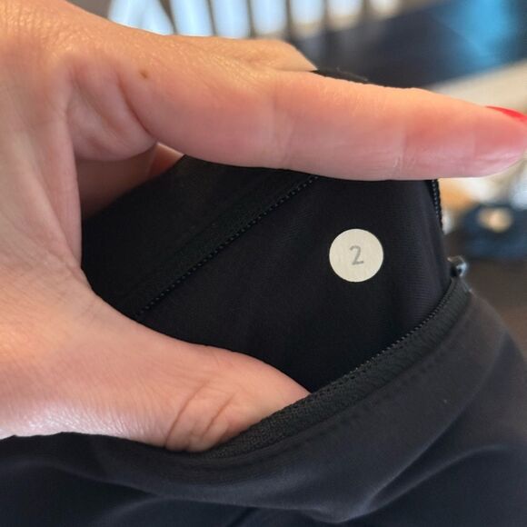 Lululemon Black High Rise Tight Stuff 23” Scallop Hem Reflective Legging - Picture 6 of 10